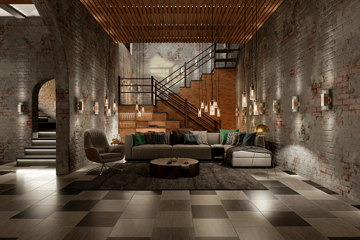 Industrial Style Living Room With Armchair, Corner Sofa, Brick Wall And Pendant Lights