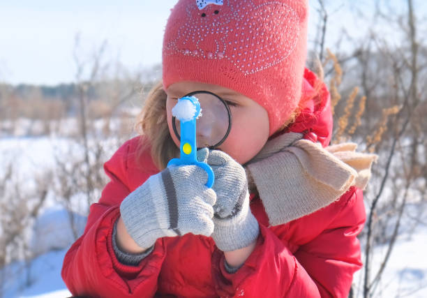 istock Child hiker exploring the winter nature. 1356303376