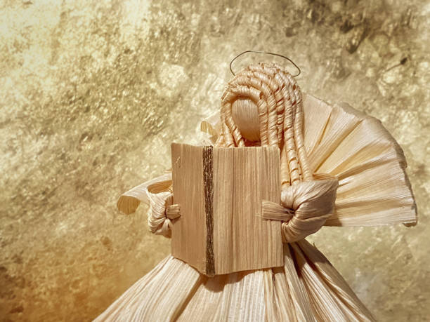 istock Golden angel with song book 1356304228