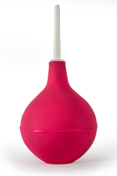 istock Rubber medical pear pink on a white background. 1356306348