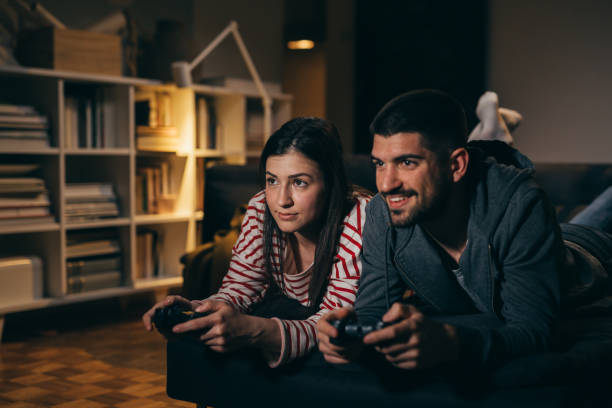 istock young couple relaxing at home. evening scene 1356310182