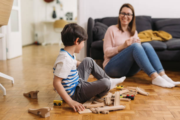 istock mother and child spending time at home 1356310191