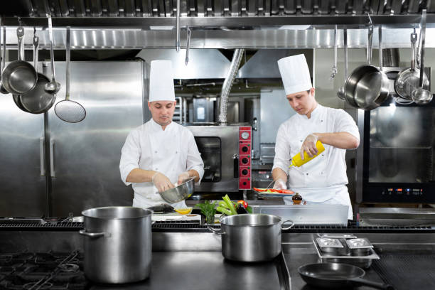 istock Chefs prepare meals in the kitchen 1356314679
