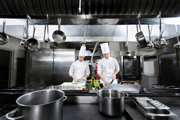 chefs prepare meals in the kitchen - chef’s utensils imagens e fotografias de stock