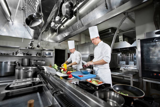 istock Chefs prepare meals in the kitchen 1356314698