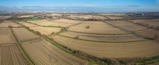 istock Panorama of uncultivated fields in winter 1356316651