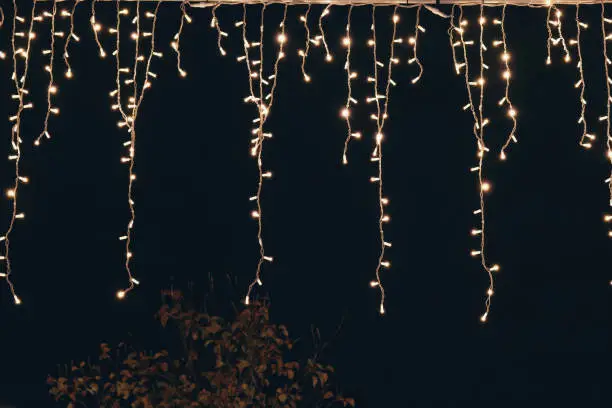 A string of lights at night for christmas