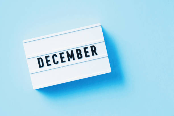 istock December Reads On White Lightbox Sitting Over Blue Background 1356320783