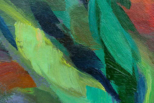 Green oil abstract background. Multicolored brush strokes close-up. Picturesque foliage texture. Modern design. Handmade on canvas. Blue, pink, gray, yellow shades. Artistic spring background.