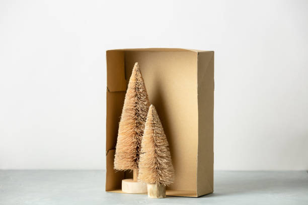istock Coconut fiber Christmas trees in a box,  zero waste concept 1356323647