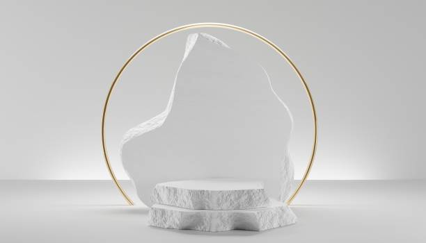 istock 3D white stone podium display. Pedestal with abstract geometric arch and golden round frame. Blank stage for cosmetics, beauty product promotion mockup. Natural rough grey rock, 3D render illustration 1356324801