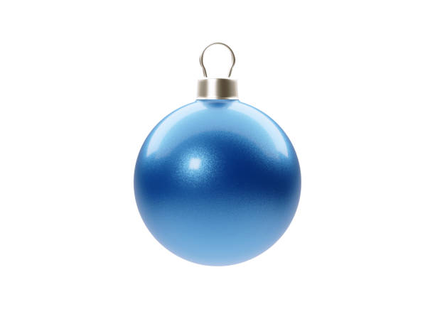 Brilliant blue Christmas baubles in the snow on a soft white/gray background.