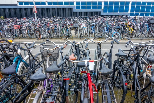 Bicycles and city bikes in Brussels. Seamless crowd of bicycles out of a station. Cycling is the best way to commute in northern European countries