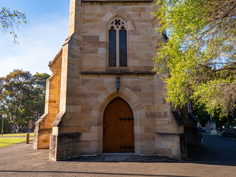 Sydney NSW Australia - July 8th 2021 - Church Facade with Sandstone Walls on a Sunny Winter Morning