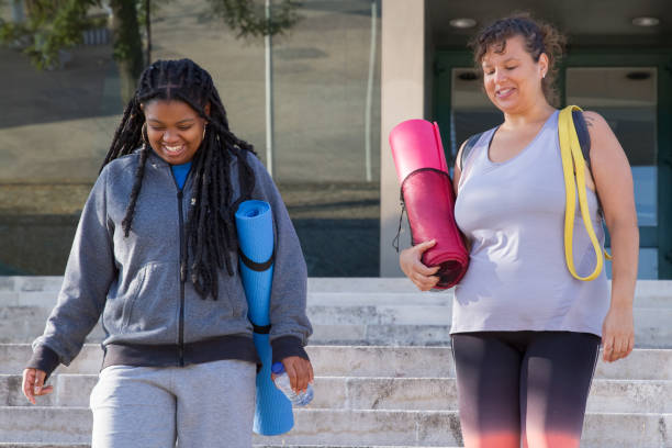 istock Pleased plus size women going home after training 1356330637