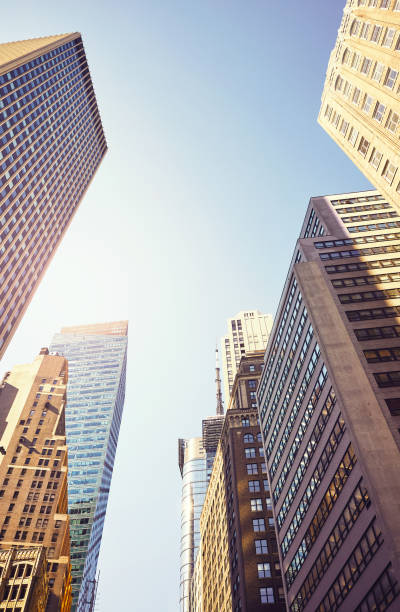 istock Looking up at New York skyscrapers, USA. 1356332784