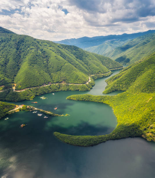 Aerial view of a picturesque mountain lake Aerial panoramic view of Vacha Dam in Rhodope Mountain, Bulgaria reservoir photos stock pictures, royalty-free photos & images