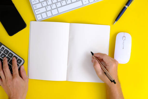 istock workspace design, mockup, top view, flat lay, copy space, closeup, office working desk with smartphone, laptop, glasses, and coffee, workspace design, mockup, top view, flat lay, copy space, closeup 1356338921