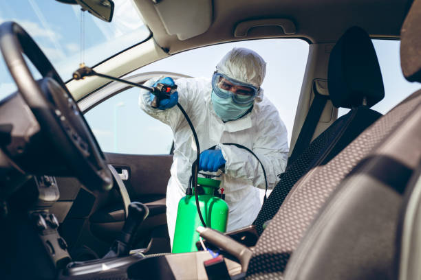 istock Protective suit spraying surfaces during coronavirus COVID-19 pandemic 1356339116
