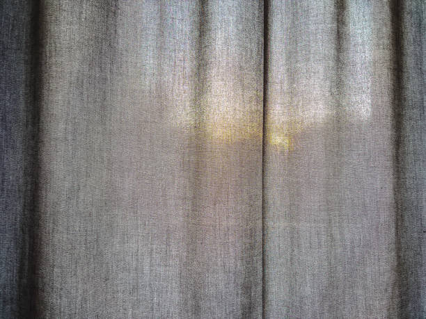 istock A dark fabric with the sun in the background. 1356339168