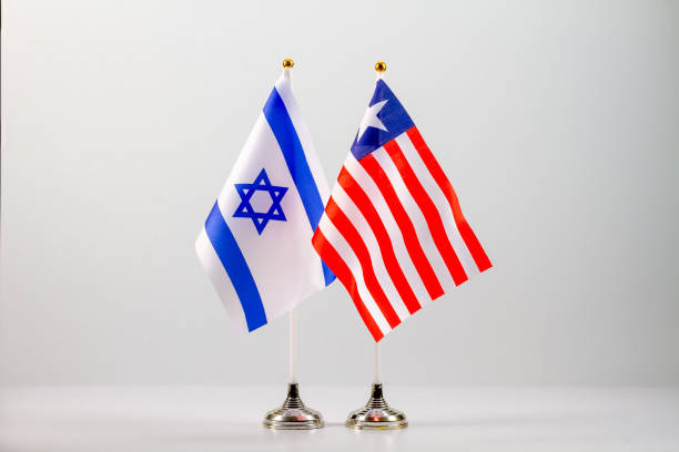 istock State flags of Israel and Liberia on a light background. 1356340201
