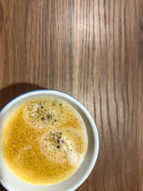 istock Freshly made coffee on a dark wood as a background. 1356341245