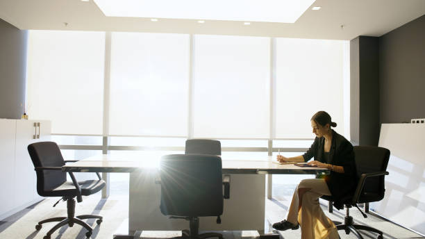 istock Businesswoman in modern office 1356342055