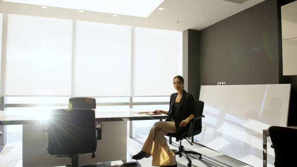 istock Businesswoman in modern office 1356342056