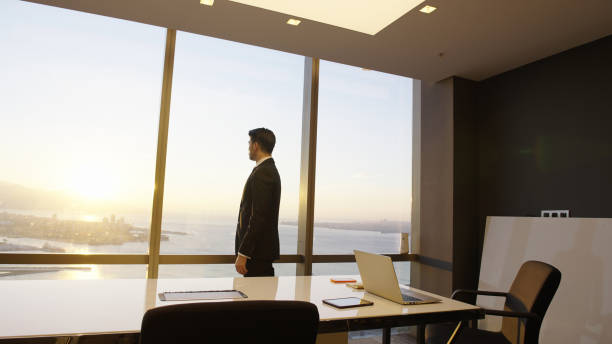 istock Businessman in modern office 1356342082