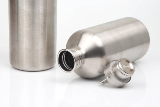 istock Steel flasks for water and drinks on a white background. Survival hiking gear 1356343585