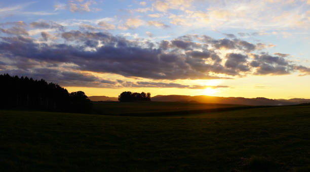 istock Sunset in the Sauerland. Landscape with setting sun in the evening. 1356344059