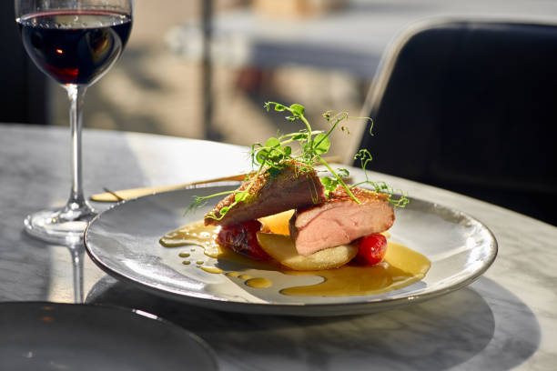 istock Duck breast with pears in orange-ginger sauce. 1356344276