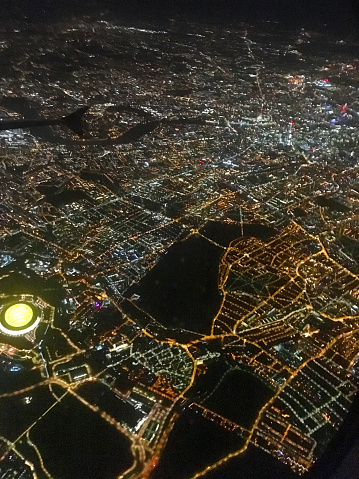 Aerial view of Stratford, area of London in the night from plane, England, UK.