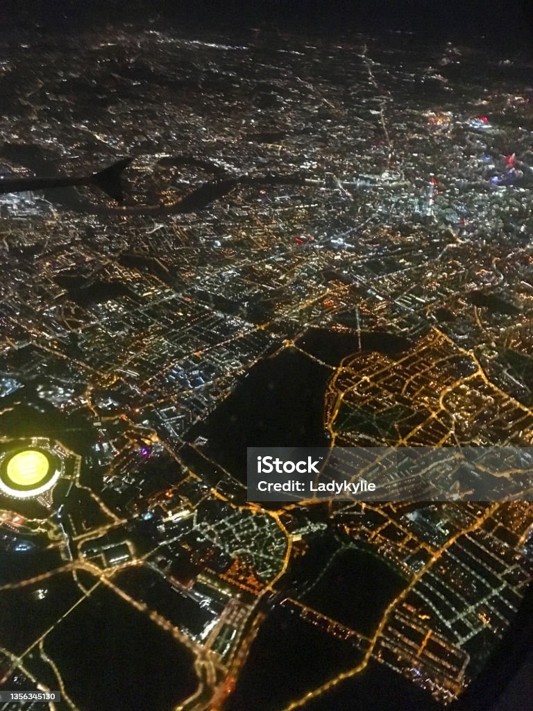 Aerial view of London area in the night Aerial view of Stratford, area of London in the night from plane, England, UK. London - England Stock Photo