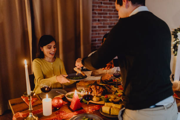 istock New year dinner at home with friends 1356345648