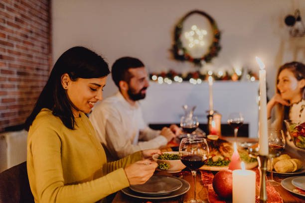 istock New year dinner at home with friends 1356345985