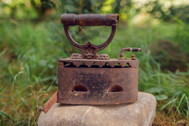 istock vintage iron. retro coal heated iron 1356348416