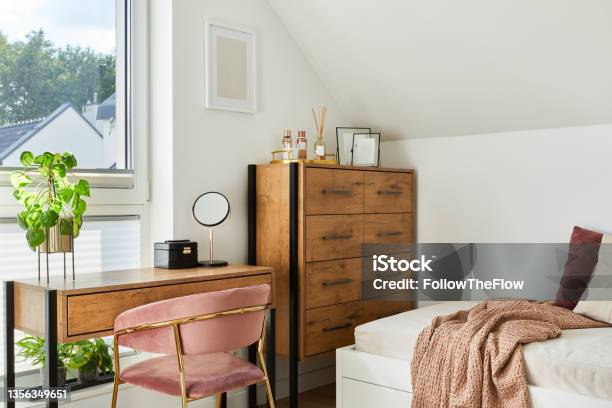 Modern Teenage Room Interior Design With Bed Table Chest Of Drawers Pink Velvet Chair And Personal Accessories Template Stock Photo - Download Image Now