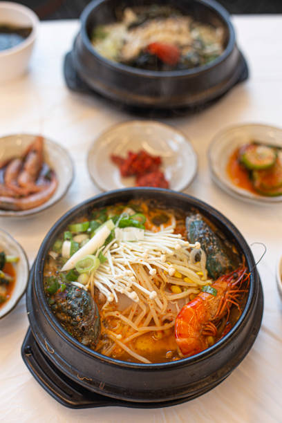 istock Korean seafood ttukbaeg. Abalone earthen pot stew. 1356349806