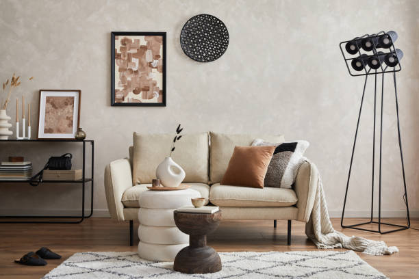 istock Modern minimalistic living room interior design with sofa, console, mock up poster frame, lamp and stylish personal accessories. Copy space. Template. 1356355390