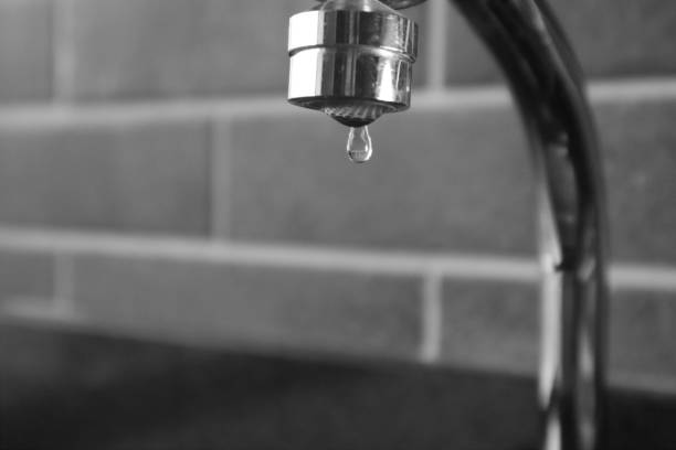 istock Pure water dripping from the tap, Selective focus. 1356355816