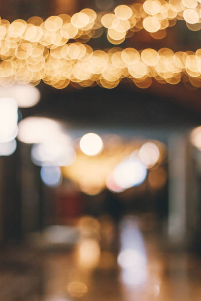 istock Blurred street with Christmas bokeh. 1356361124