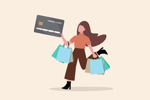 Consumerism, overspending or shopaholic causing credit card debt and poverty, shopping addiction spend more than your income, happy young woman holding shopping bags with credit card payment checkout.