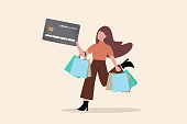 istock Consumerism, overspending or shopaholic causing credit card debt and poverty, shopping addiction spend more than your income, happy young woman holding shopping bags with credit card payment checkout. 1356361316