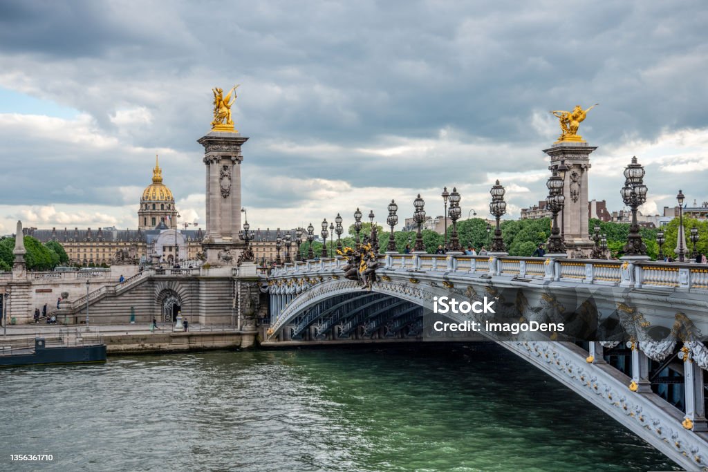 Bridge Alexandre III with view to the Military Museum, Paris Bridge Alexandre III with view to the Military Museum, Paris France Arch - Architectural Feature Stock Photo
