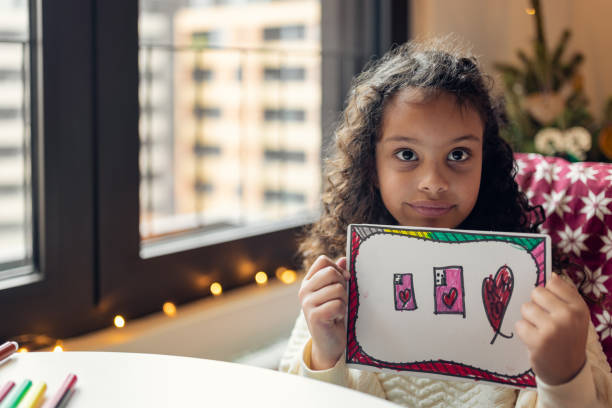 istock Girl with a Christmas wish list 1356362527