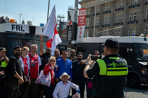 Policeman Taking Photos With Ajax Fans And Tourists At The Leidseplein Amsterdam The Netherlands 2019