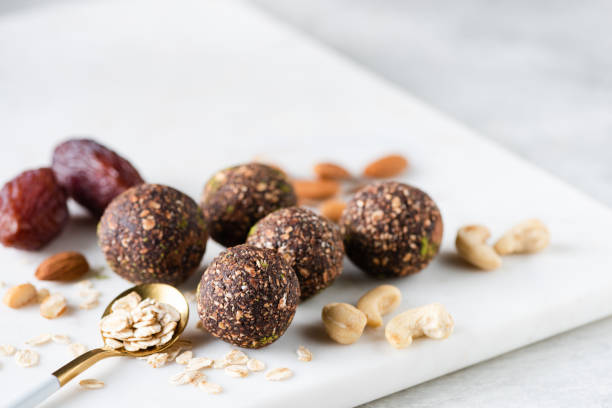 istock Raw vegan energy balls with dates, nuts and oats 1356367975
