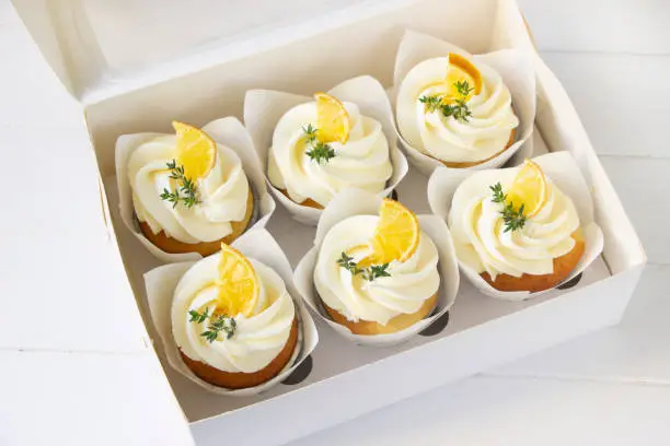 Photo of Cupcakes decoraited with lemon and thyme