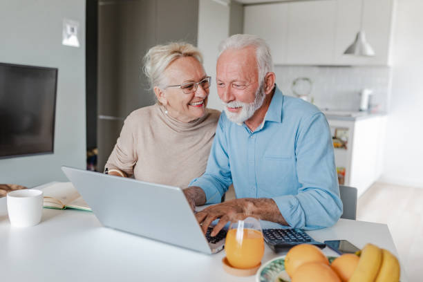 istock Home finances planning for a senior couple 1356372144